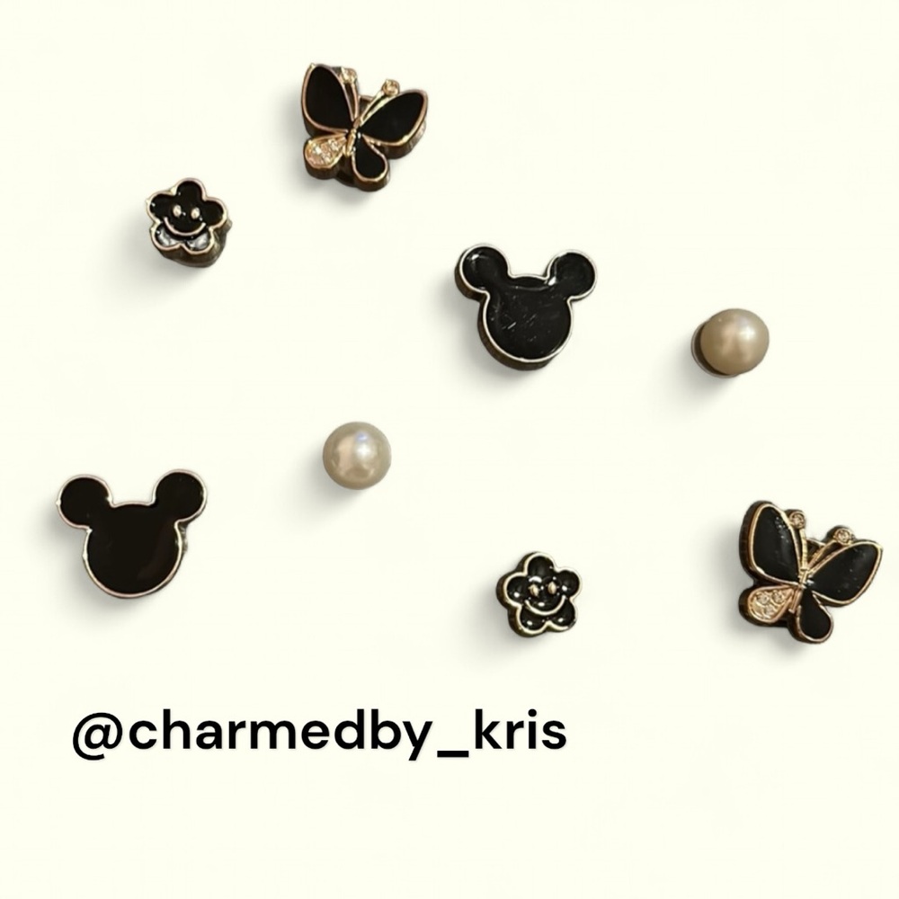 69. Croc charms - black and gold